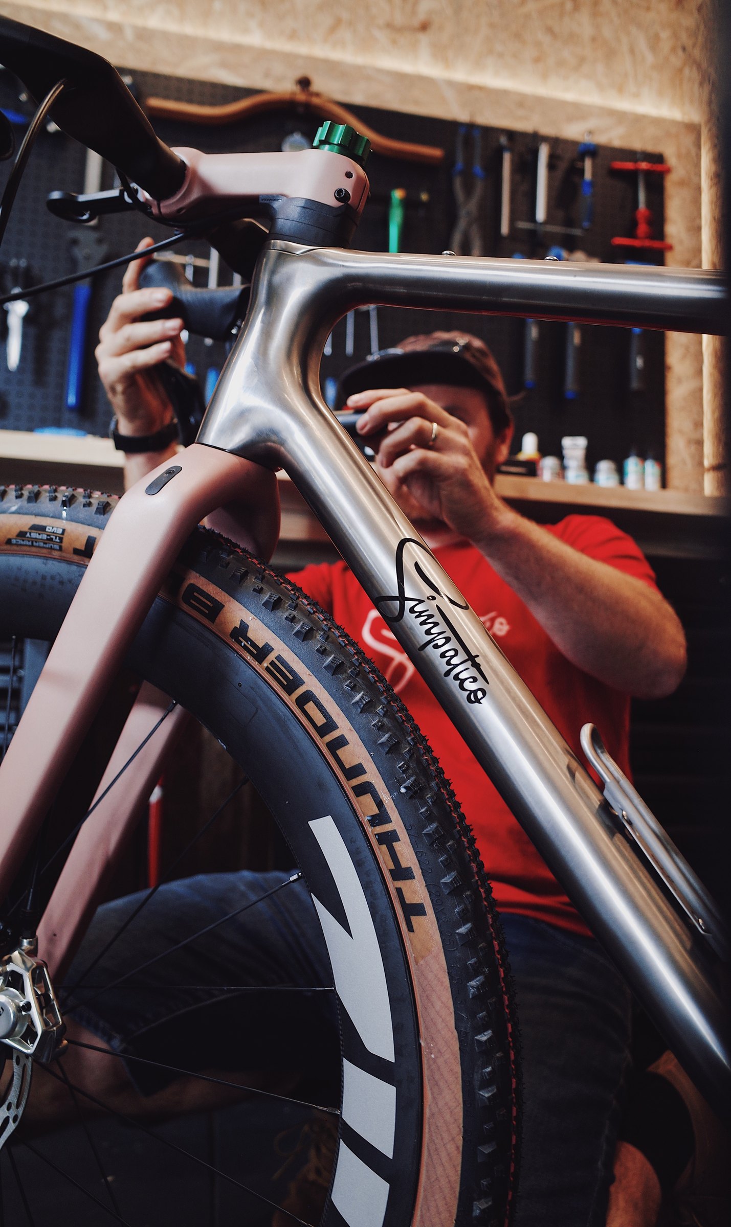 Fork and front wheel clearance detail on a Gamma Race titanium gravel bike build