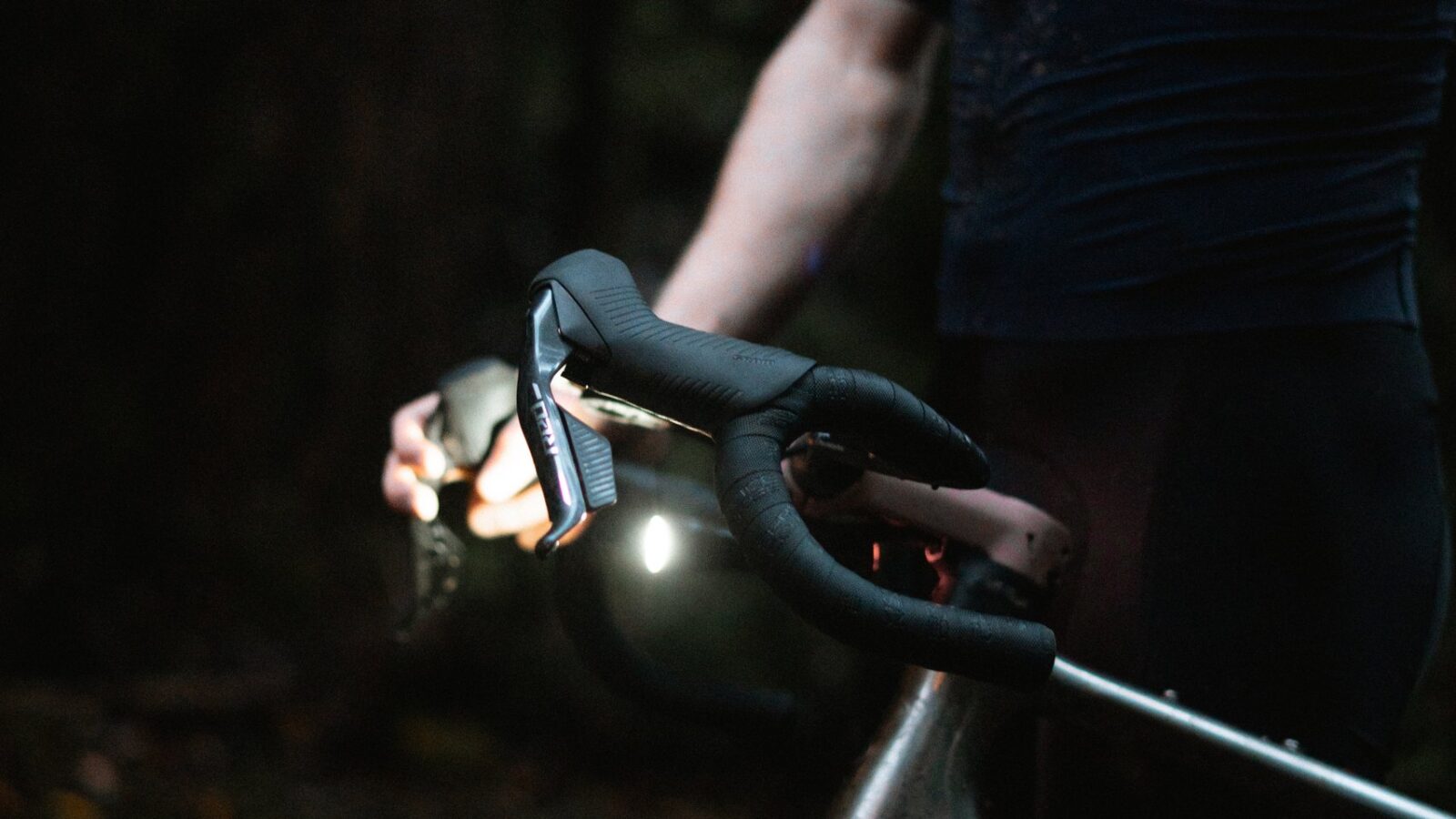 Gamma Race cockpit and front light detail on wet Otways gravel